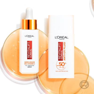 L&#039;Oréal Paris Revitalift Clinical Pure 12% Vitamin C Подаръчен комплект серум Revitalift Clinical Vitamin C Serum 30 ml + дневен крем за лице Revitalift Clinical Vitamin C Anti-UV Fluid SPF50 50 ml