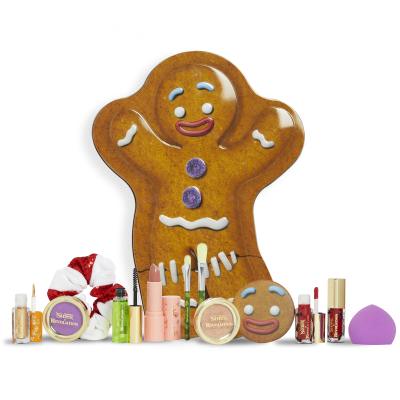 Makeup Revolution London Shrek Gingy 12 Days Advent Calendar Подаръчен комплект сенки за очи 2 бр + хайлайтър 1 бр + гланц за устни 2 бр + червило 1 бр + руж 1 бр + гел за вежди 1 бр + четка 2 бр + гъба за грим 1 бр + огледало 1 бр + ластик за коса 1 бр